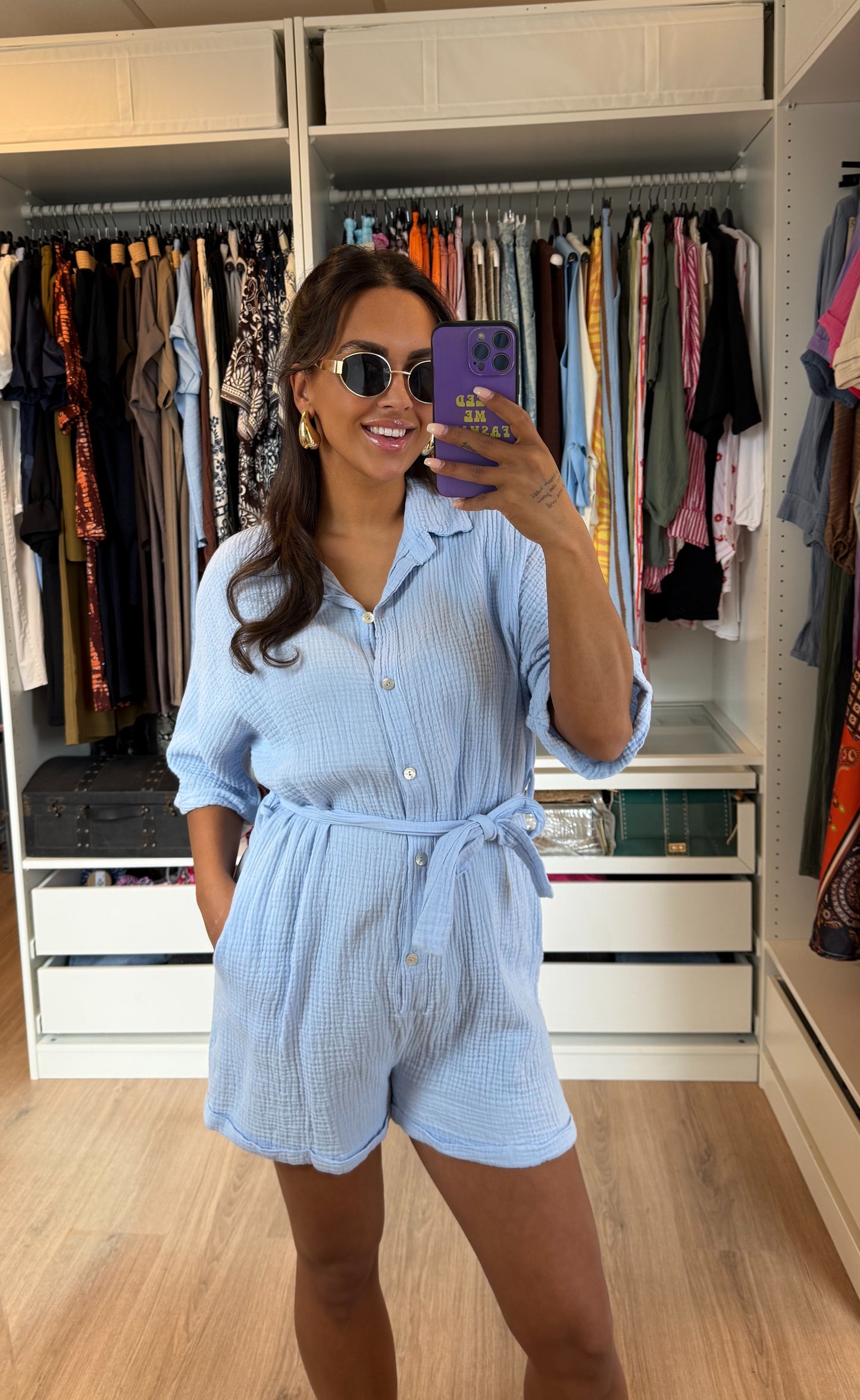 Mousseline jumpsuit met ceintuur lichtblauw